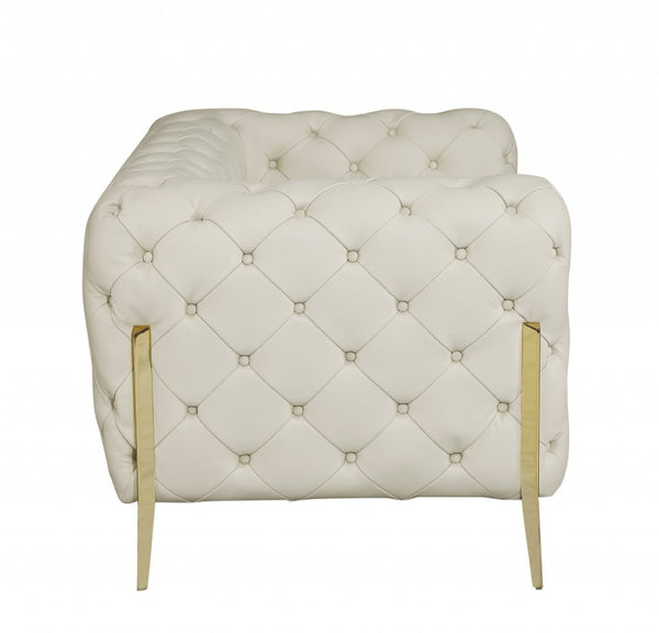 HomeRoots 69" Faux Leather Love Seat - Contemporary Comfort with Pillow-Top Arms for Modern Living Spaces CREAM 477573