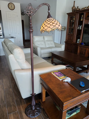 HomeRoots 62" Elegant Brown and White Floor Lamp with White Glass Shade for Timeless Home Illumination 478082