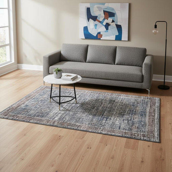 HomeRoots 5' Blue Oriental Area Rug with Distressed Finish - Stain-Resistant & Elegant Home Decor Solution 5' X 8' 478945