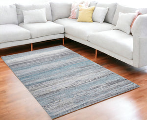 Homeroots 5' X 8' Turquoise And Gray Abstract Stain Resistant Area Rug  Polyester 478966