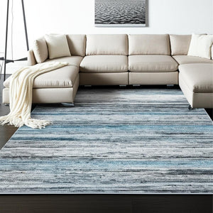 HomeRoots 5' Turquoise and Gray Abstract Area Rug - Stylish, Stain-Resistant Design for Modern Spaces 8' X 10' 478967