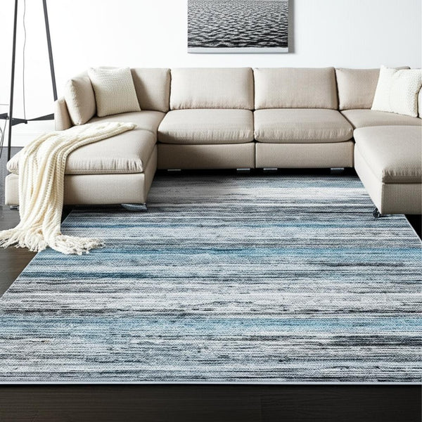 HomeRoots 5' Turquoise and Gray Abstract Area Rug - Stylish, Stain-Resistant Design for Modern Spaces 8' X 10' 478967