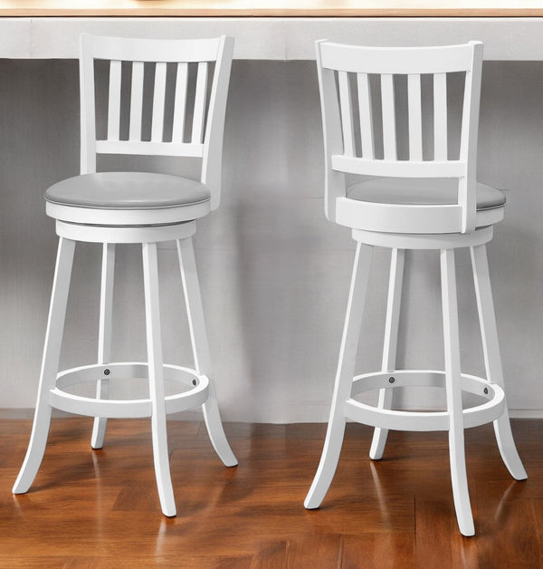 Homeroots Set Of Two 29 " Gray And White Faux Leather And Solid Wood Swivel Bar Height Bar Chairs   479165