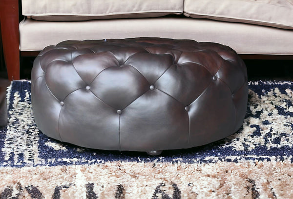 Homeroots 41" Brown Genuine Leather And Dark Brown Tufted Round Ottoman   479225