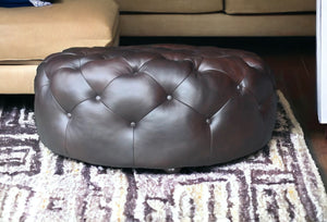 Homeroots 41" Brown Genuine Leather And Dark Brown Tufted Round Ottoman   479225