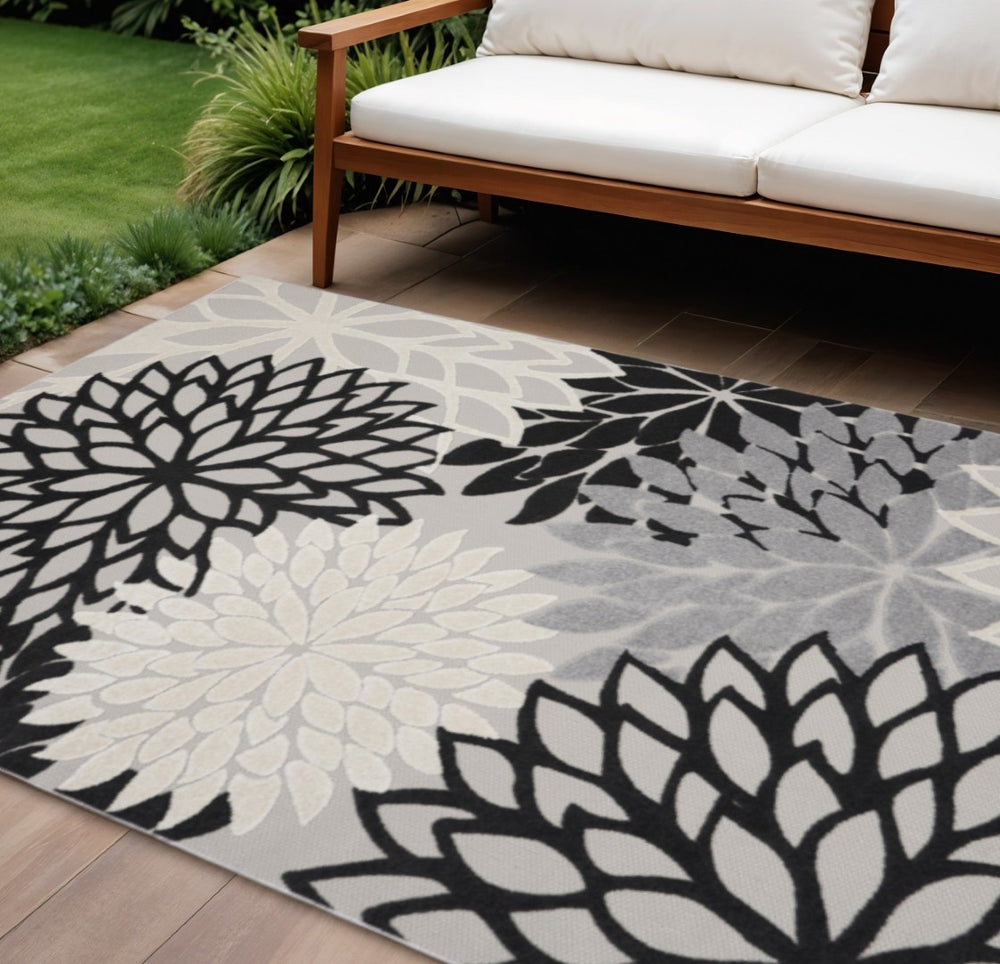 HomeRoots 9' X 12' Black and White Area Rug – Stylish, Durable, and Versatile for Indoor & Outdoor Spaces! 479270