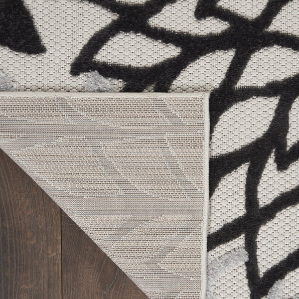 HomeRoots 9' X 12' Black and White Area Rug – Stylish, Durable, and Versatile for Indoor & Outdoor Spaces! 479270