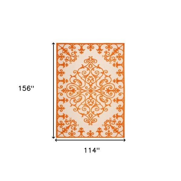 HomeRoots 10' Orange and Ivory Area Rug - Stylish Indoor/Outdoor Damask Design, Durable, Easy-Care, Versatile! 479300