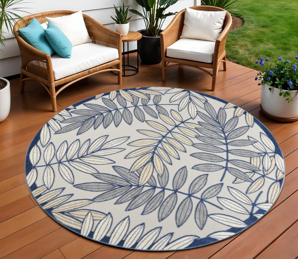 HomeRoots 8' Round Ivory and Blue Indoor Outdoor Area Rug - Durable, Soft, and Stylish for Any Space! 479352