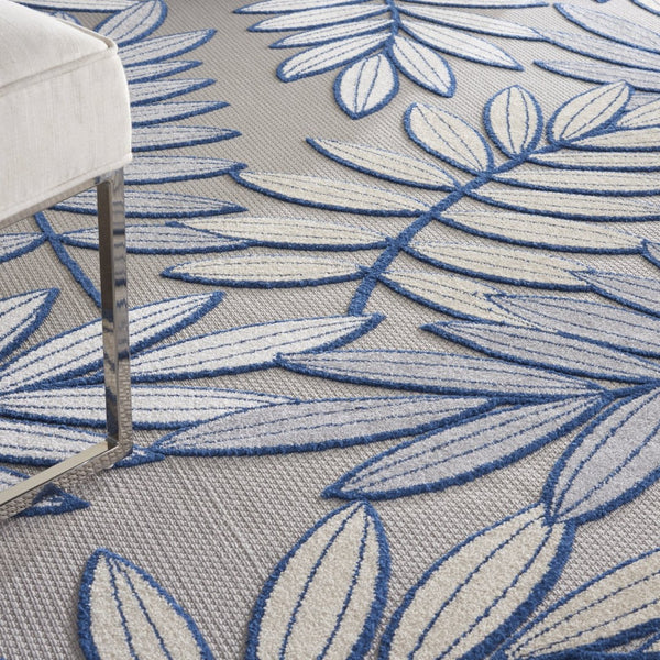 HomeRoots 10' Ivory and Blue Indoor/Outdoor Area Rug - Timeless Floral Design for High-Traffic Spaces 479354