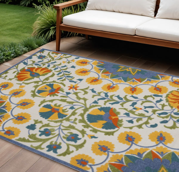 HomeRoots 10' Indoor Outdoor Area Rug in Vibrant Blue & Yellow Floral Design – Durable, Stylish & Easy Care! 479386