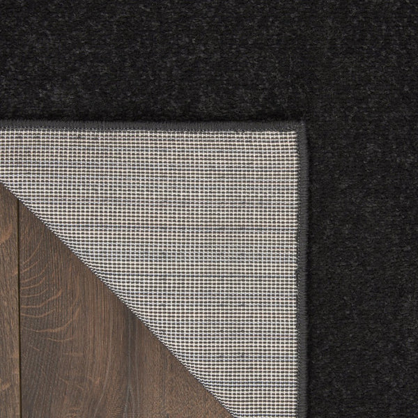 HomeRoots 6' X 9' Black Stain Resistant Area Rug - Durable, Easy-Care, Versatile for Indoor & Outdoor Spaces 479442