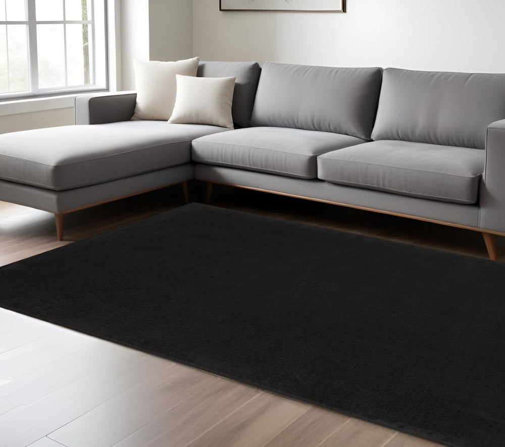 HomeRoots 6' X 9' Black Stain Resistant Area Rug - Durable, Easy-Care, Versatile for Indoor & Outdoor Spaces 479442