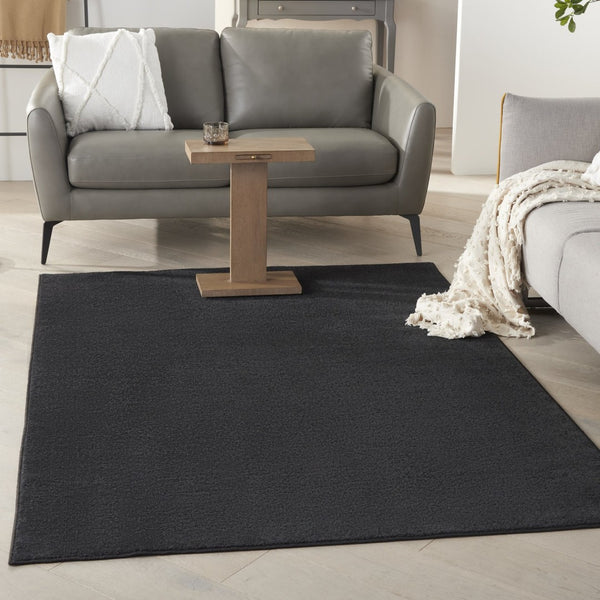 HomeRoots 6' X 9' Black Stain Resistant Area Rug - Durable, Easy-Care, Versatile for Indoor & Outdoor Spaces 479442