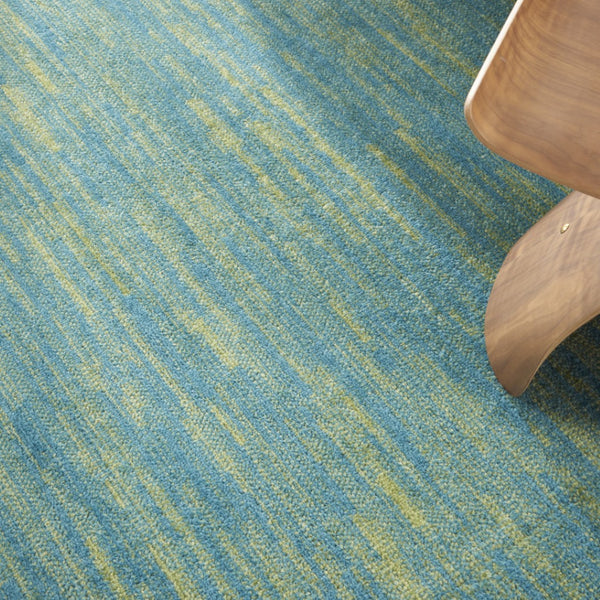HomeRoots 8' Round Indoor Outdoor Area Rug in Vibrant Blue & Green - Durable, Soft, Non-Slip Design for All Spaces 479458