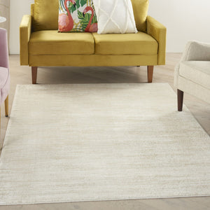 HomeRoots 6' X 9' Beige and Ivory Durable Area Rug - Stylish Indoor/Outdoor Design for High-Traffic Spaces 479506