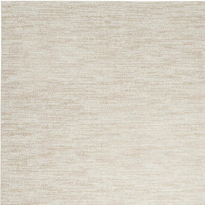 HomeRoots 7' X 10' Beige and Ivory Area Rug - Stylish Low-Pile Indoor/Outdoor Rug for All Décor Styles 479508