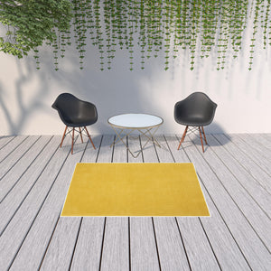 Homeroots 5' X 7' Yellow Non Skid Indoor Outdoor Area Rug  Polypropylene 479633