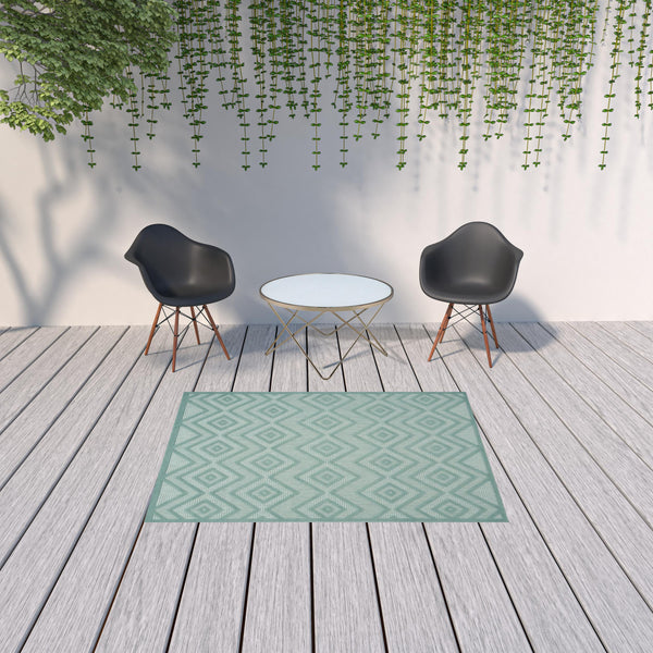 Homeroots 5' X 7' Aqua And Teal Argyle Indoor Outdoor Area Rug  Polypropylene And Polyester 479649