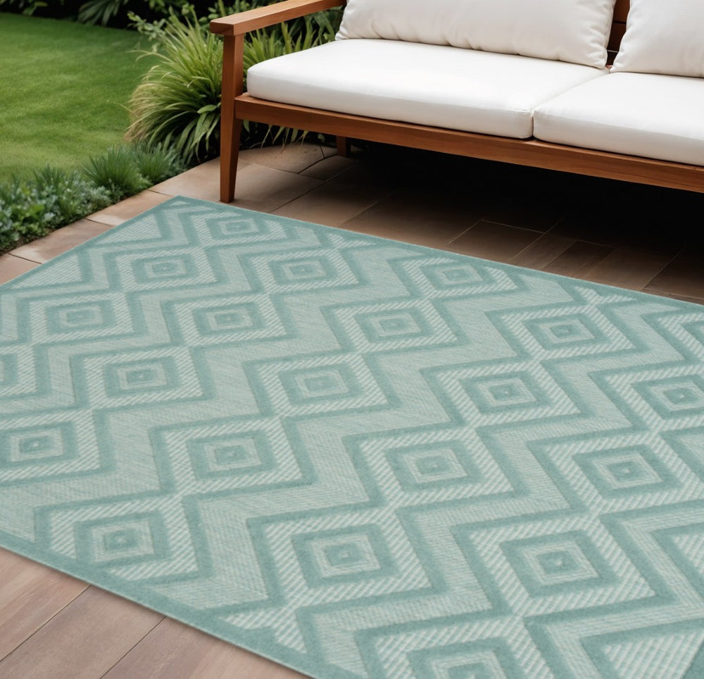 HomeRoots 6' X 9' Aqua Area Rug - Durable, Low-Maintenance Indoor/Outdoor Rug with Timeless Argyle Design 479651