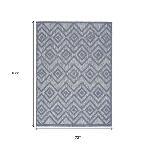 HomeRoots 6' X 9' Denim Blue Indoor Outdoor Area Rug - Durable, Soft, Coastal Charm for Versatile Spaces 479662