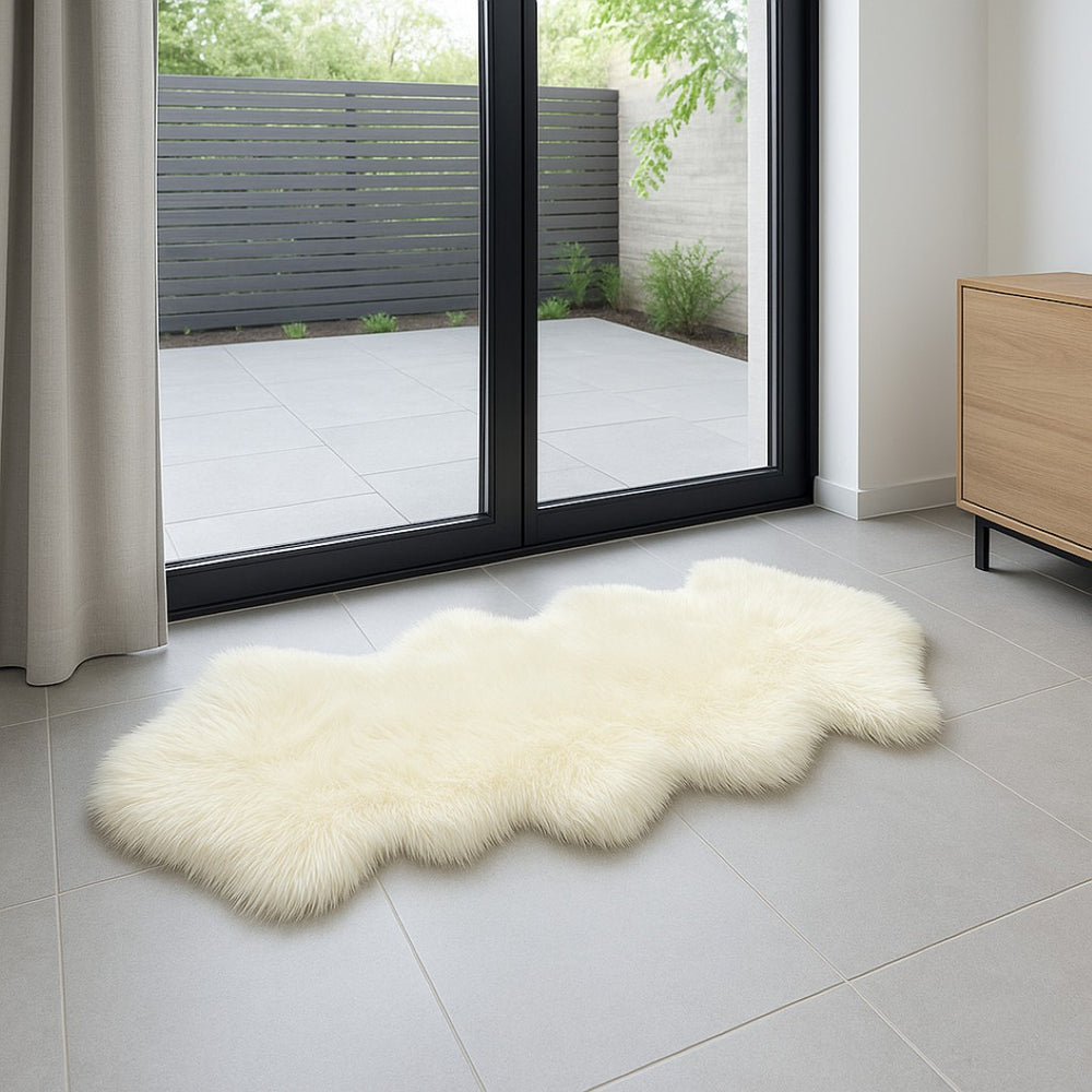 HomeRoots 2' X 6' Handmade Wool Sheepskin Area Rug - Luxurious, Cozy Accent for Modern & Traditional Spaces Ivory 480107