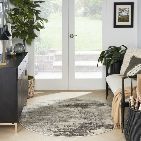 HomeRoots 4' Abstract Ivory and Grey Area Rug – Modern Power Loomed Design for Cozy, Stylish Living Spaces 5' Round Round 480119