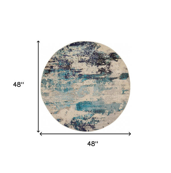 Homeroots 4' X 4' Ivory And Teal Blue Round Abstract Power Loom Non Skid Area Rug  Polypropylene 480136