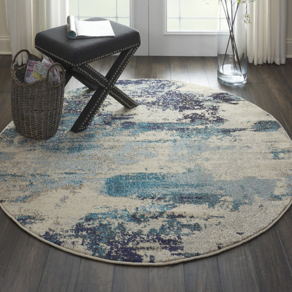 HomeRoots 4' Abstract Area Rug in Ivory and Teal Blue - Modern Design for Stylish Home Décor and Comfort 4' Round Round 480136