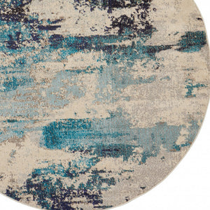 Homeroots 5' X 5' Ivory And Teal Blue Round Abstract Power Loom Non Skid Area Rug  Polypropylene 480137