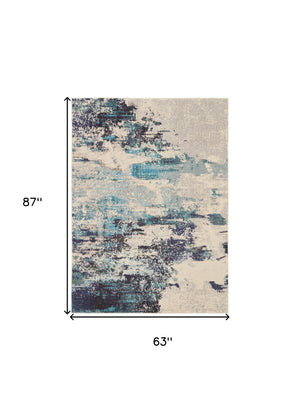 Homeroots 5' X 7' Ivory And Teal Blue Abstract Power Loom Non Skid Area Rug  Polypropylene 480138