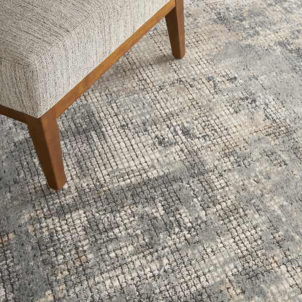 HomeRoots 5' Blue and Beige Abstract Area Rug - Durable Power Loomed Design with Non-Skid Backing for Style 5' X 7' 480234