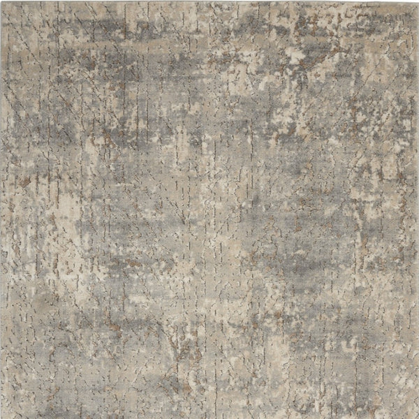 HomeRoots 5' Beige and Grey Abstract Area Rug - Power Loomed, Non-Skid Backing for Living Room Comfort 5' X 7' 480239