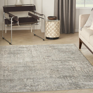 HomeRoots 5' Beige and Grey Abstract Area Rug - Power Loomed, Non-Skid Backing for Living Room Comfort 5' X 7' 480239