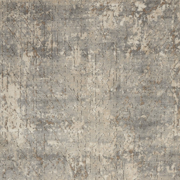 HomeRoots 5' Beige and Grey Abstract Area Rug - Power Loomed, Non-Skid Backing for Living Room Comfort 5' X 7' 480239