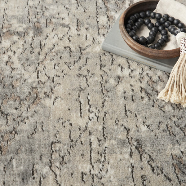 HomeRoots 5' Beige and Grey Abstract Area Rug - Power Loomed, Non-Skid Backing for Living Room Comfort 5' X 7' 480239