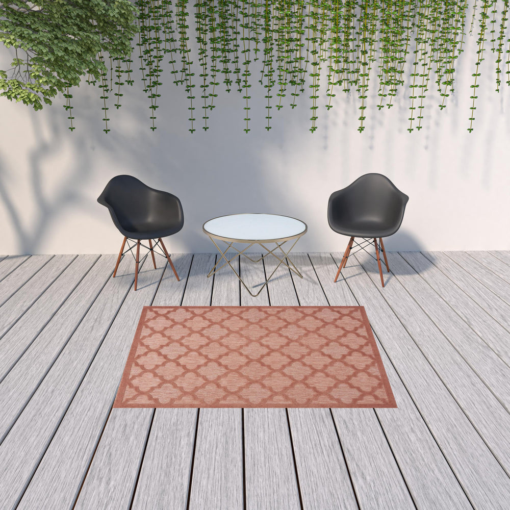 Homeroots 5' X 7' Coral Orange Ikat Indoor Outdoor Area Rug  Polypropylene And Polyester 480395