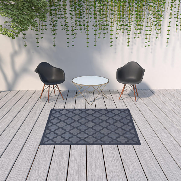 Homeroots 5' X 7' Navy Blue Ikat Indoor Outdoor Area Rug  Polypropylene And Polyester 480403