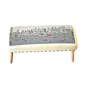 HomeRoots 38" Cream Wool Ottoman with Brown Trim - Versatile Rectangular Design for Elegant Living Spaces 480550