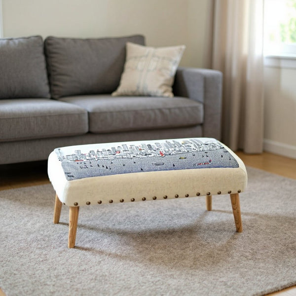 HomeRoots 38" Cream Wool Ottoman with Brown Trim - Versatile Rectangular Design for Elegant Living Spaces 480550