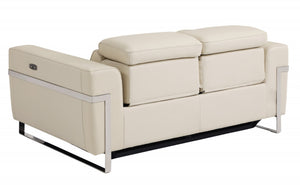 HomeRoots Two Piece Indoor Beige Italian Leather Seating Set – Luxurious Reclining Sofa & Loveseat for Five 480881