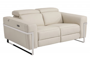 Homeroots 65" Beige And Silver Italian Leather Power Reclining Loveseat Beige  482202