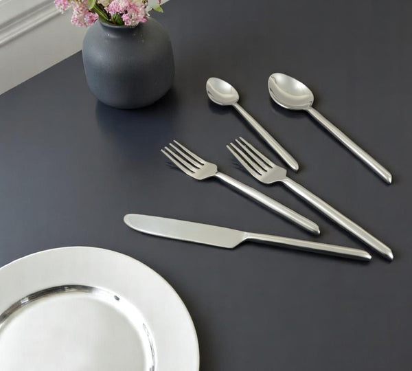 HomeRoots Glossy Silver Stainless Steel 20-Piece Hand-Forged Flatware Set – Modern Elegance for Every Table 482258