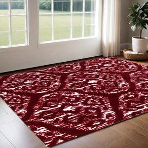 Homeroots 2' X 4' Red And White Ikat Tufted Washable Non Skid Area Rug  Nylon 482717