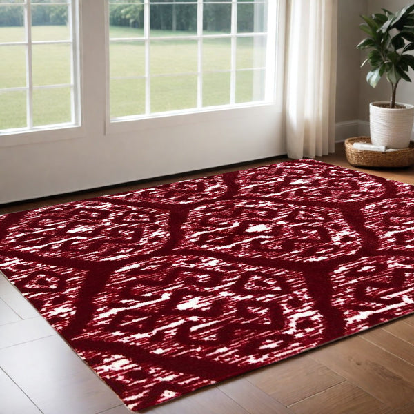Homeroots 2' X 4' Red And White Ikat Tufted Washable Non Skid Area Rug  Nylon 482717
