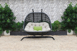 Homeroots 69" Beige And Black Aluminum Indoor Outdoor Swing Chair With Beige Cushion  Rattan,Aluminium,Fabric 482868