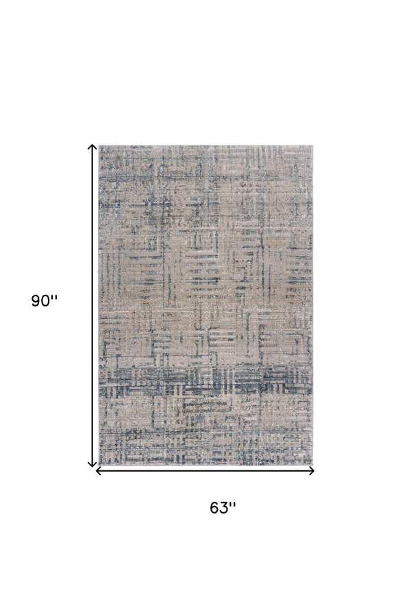 Homeroots 5' X 8' Cream Blue And Ivory Geometric Distressed Stain Resistant Area Rug  Polyester 482980