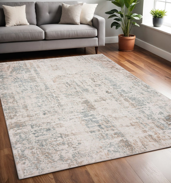 HomeRoots 5' Abstract Distressed Area Rug in Gray, Blue, Taupe & Cream - Stain Resistant for Modern Spaces 5' X 7' 482992