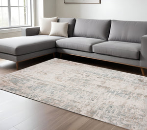 HomeRoots 5' Abstract Distressed Area Rug in Gray, Blue, Taupe & Cream - Stain Resistant for Modern Spaces 8' X 10' 482993