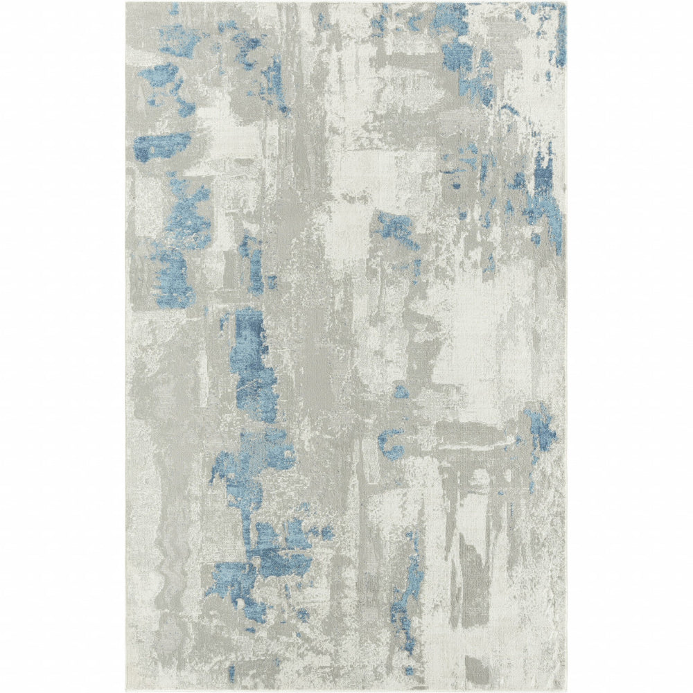 Homeroots 9' X 12' Ivory Gray And Blue Abstract Power Loom Stain Resistant Area Rug  Polyester 483035
